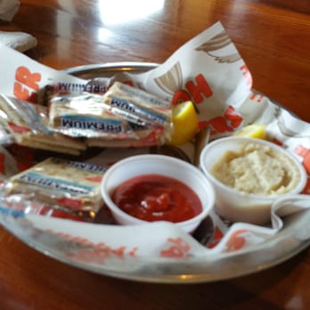Hooters - Cocktail sause, crackers, lemons and horseradish sauce! - American Near Me - Orlando, Florida Hooters - Cocktail sause, crackers, lemons and horseradish sauce! - American Near Me - Orlando, Florida