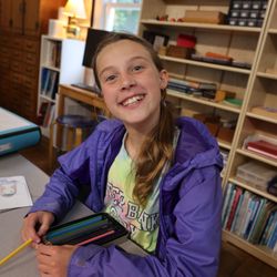 Mater Amoris Montessori School - A joyful Upper Elementary student (9-12yr)