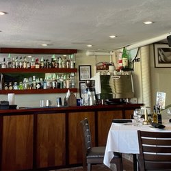 Serafina Italian Restaurant & Waterfront Bistro - Bar area with tables