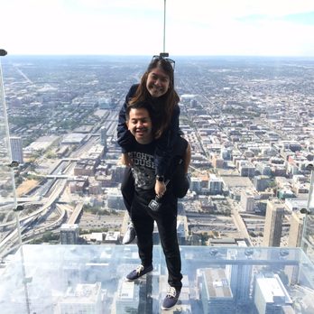 Skydeck Chicago - Worker took our photo - the box to ourselves. - Observatories Near Me - Chicago, Illinois Skydeck Chicago - Worker took our photo - the box to ourselves. - Observatories Near Me - Chicago, Illinois