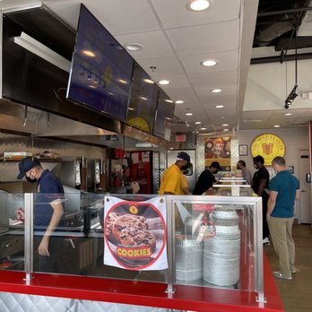 The Halal Guys - customers at the counter - Middle Eastern Near Me - Rockville, Maryland