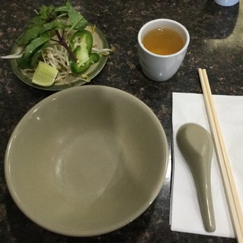 Pho 99 - A place setting, condiments for the pho. - Vietnamese Near Me - Coquitlam, British Columbia Pho 99 - A place setting, condiments for the pho. - Vietnamese Near Me - Coquitlam, British Columbia