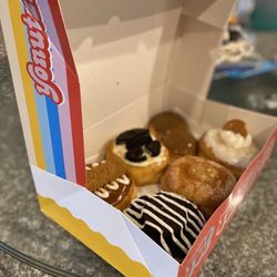 Yonutz - Half a dozen donuts: Salted Caramel Biscoff, Caramel Oreo Cheesecake, Classic Maple, Vanilla Wafer, Apple Pie, & Cookies and Cream.