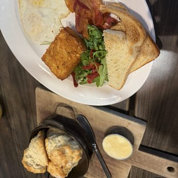 Stella San Jac - Biscuits and Americano Breakfast with bacon. - New American Near Me - Austin, Texas
