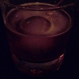 Up in Smoke.  It's dark in the room, but the drink is too.  Smokey, but flavorful. An easy contender for my favorite cocktail.