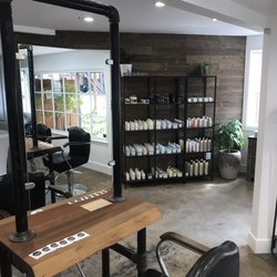 Bash Salon - Beautiful redwood tables and the most Comfortable salon chair I have ever been in