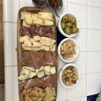 Grater Goods - Top to bottom: Thomasville Thome, barley swine salame, Daikin Dairy spicy cheddar, Lomo, and rocket's robiola - Cheese Shops Near Me - Jacksonville, Florida