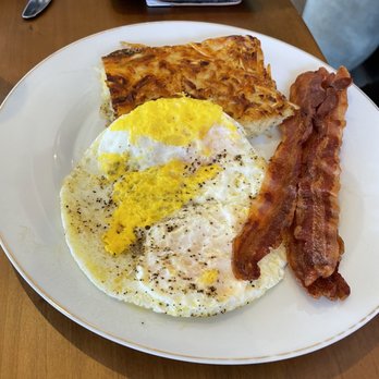 The Shoe Bar & Grill - Bacon crispy and over hard eggs... Not the way I like it but that's the way they were ordered - American Near Me - Reno, Nevada The Shoe Bar & Grill - Bacon crispy and over hard eggs... Not the way I like it but that's the way they were ordered - American Near Me - Reno, Nevada