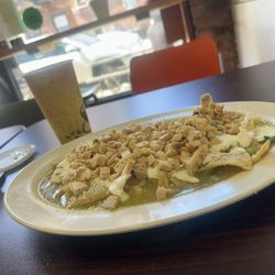 Green chilaquiles with grill chicken.