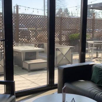 Rendition - Dining area and patio in background - New American Near Me - Tukwila, Washington