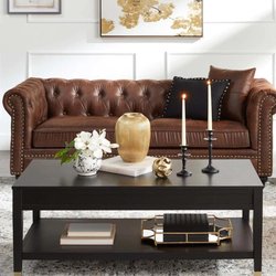 A luxurious Chesterfield-style brown faux leather tufted sofa from the Providence collection, exuding sophistication and comf...