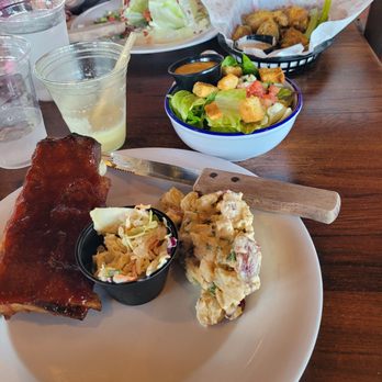 Pelican Pete's - Half rack of sweet coated ribs comes with potato salad.. - American Near Me - Gainesville, Georgia