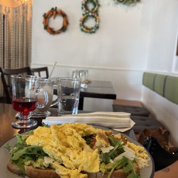 Zaatar Bistro - Avocado toast with added scrambled eggs - Breakfast & Brunch Near Me - Fresno, California Zaatar Bistro - Avocado toast with added scrambled eggs - Breakfast & Brunch Near Me - Fresno, California