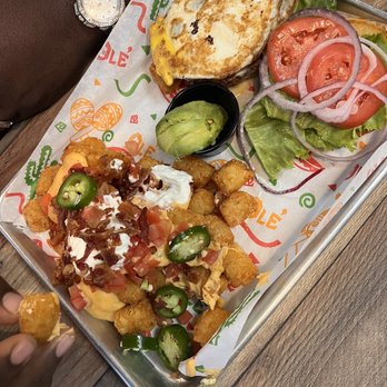 Indys Burger Joint - ChorizoBurger w/fried egg and loaded tots - American Near Me - Indianapolis, Indiana