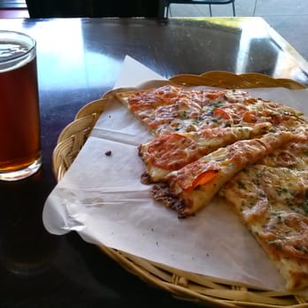 Sliver Pizzeria - Half a pizza of fresh roma tomatoes, red onions, mozzarella & aged asiago cheeses, fresh herbs, & garlic olive oil - plus a pint - Pizza Near Me - Berkeley, California