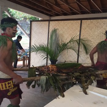 Chief's Luau - Carrying the pig away - Performing Arts Near Me - Kapolei, Hawaii Chief's Luau - Carrying the pig away - Performing Arts Near Me - Kapolei, Hawaii