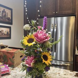 Blackshear Flowers - Lisa read my mind! Absolutely perfect for my Mom's 65th! I'm not the easiest to please, to say the least, but she rocked it!