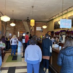 Black Cat Coffeehouse - The front of the café, with a pretty long line.
