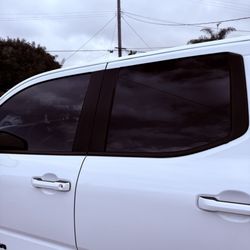 323 Kuztoms - My Tacoma tinted on both sides and rear windows.