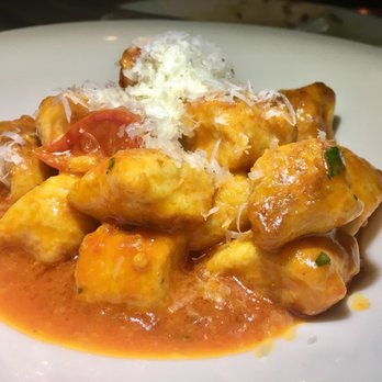 Iron Gate - Caramelizad ricotta gnocchi w/ Calabrian chili, pecorino, roasted tomatoes - New American Near Me - Washington, DC, District of Columbia