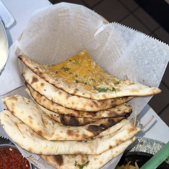 Main Street Kitchen - Garlic Cheese Naan - Indian Near Me - Clawson, Michigan Main Street Kitchen - Garlic Cheese Naan - Indian Near Me - Clawson, Michigan