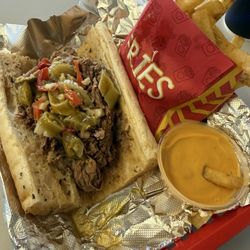 Poor Boy 2 - The number 5. Above average fries and add cheese sauce.