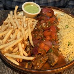 Torogoz - My husband enjoyed his lomo (filet) saltado.