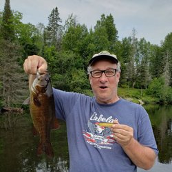 Michi-Aho Resort - 18 inch smallmouth fishing topwater lures in the river.