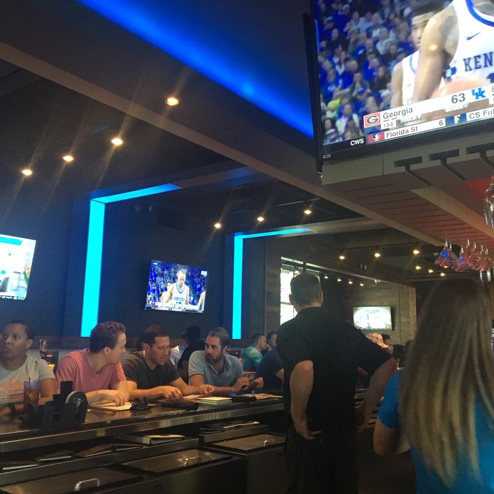 Topgolf - Great place to watch sports while waiting for a bay - Golf Near Me - Charlotte, North Carolina Topgolf - Great place to watch sports while waiting for a bay - Golf Near Me - Charlotte, North Carolina