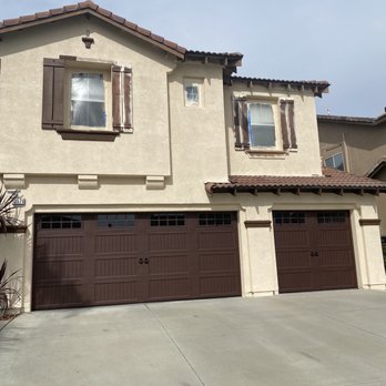 Soderstrom Garage Doors - Full view of both doors (painting under way) - Garage Door Services Near Me