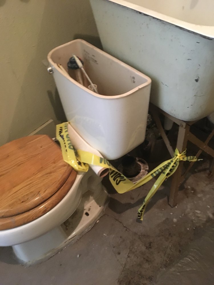 Slide of AA Plumbing & Drain Team