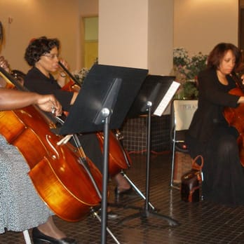 Ottley Music School Inc - cello students with teacher on right. - Musical Instruments & Teachers Near Me - Hyattsville, Maryland Ottley Music School Inc - cello students with teacher on right. - Musical Instruments & Teachers Near Me - Hyattsville, Maryland