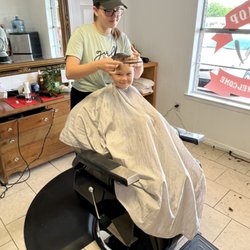 Kemp Barber Shop - Barbers in action