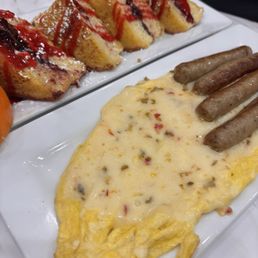 Raspberry Stuffed French Toast Eggs with Cheese and Sausage links