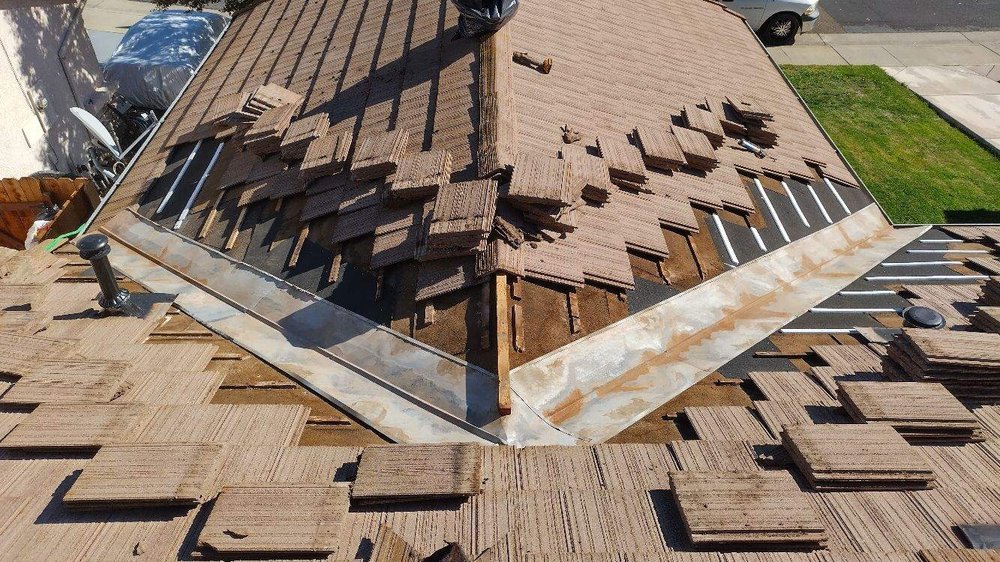 Slide of Quinn Bro's Roofing