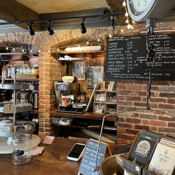 Mindpub Cafe - a coffee shop with a brick wall - Venues & Event Spaces Near Me - Baltimore, Maryland