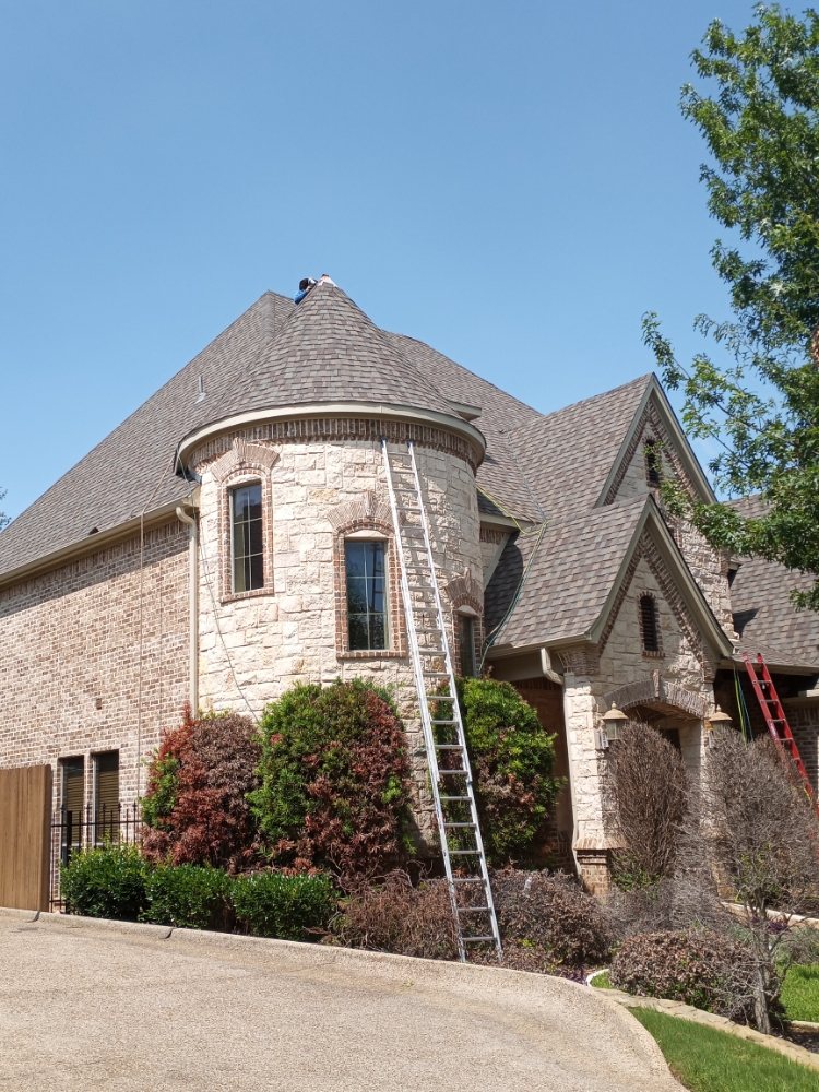 Slide of Macaw Roofing