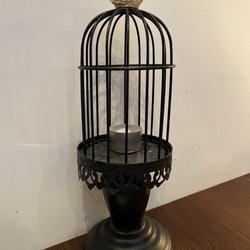 Chayada Thai Cuisine - A small, ineffective, yet decorative bird cage!