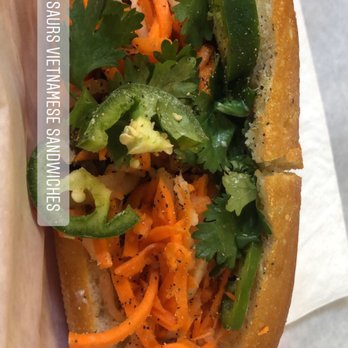 Photo of Dinosaurs - San Francisco, CA, United States. The shaking beef sandwich. The bread texture, the meat, the sauce, top 2 banh mi!!!!