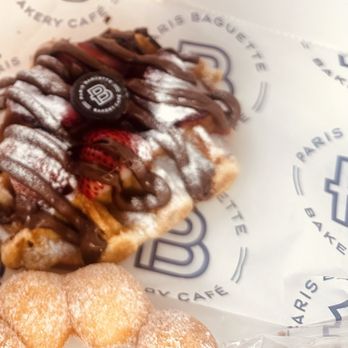 Paris Baguette - Belgian Waffle with Strawberry & Nutella and Sugar Mochi Donut (corner: Chocolate Cream Bread) - Bakeries Near Me - Avon, Ohio Paris Baguette - Belgian Waffle with Strawberry & Nutella and Sugar Mochi Donut (corner: Chocolate Cream Bread) - Bakeries Near Me - Avon, Ohio