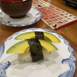 Miso soup and avocado nigiri. Miso soup and avocado nigiri.