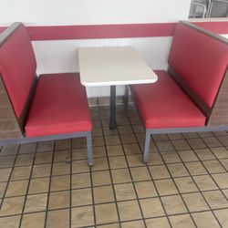 Crumbs on the seat, floor and table.