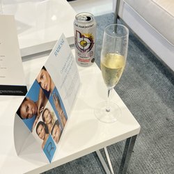 Cosmetica Med Spa - Enjoying a glass of champagne while I fill out my paperwork