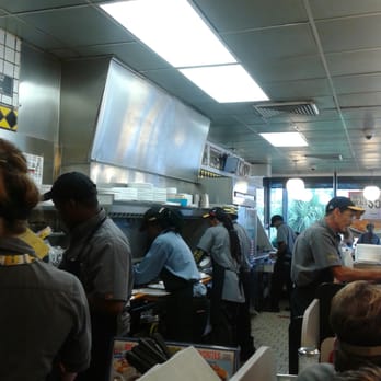 Waffle House - Orange Park - Working the grill.  Magic! - Diners Near Me - Orange Park, Florida