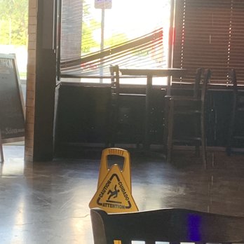 Lantern St Grill & Tap House - a caution sign - Sports Bars Near Me - Plano, Texas Lantern St Grill & Tap House - a caution sign - Sports Bars Near Me - Plano, Texas