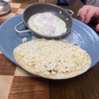 Cali Cafe - Sweet Corn Arepa with Cheese and fried eggs - Coffee & Tea Near Me - Riverview, Florida Cali Cafe - Sweet Corn Arepa with Cheese and fried eggs - Coffee & Tea Near Me - Riverview, Florida