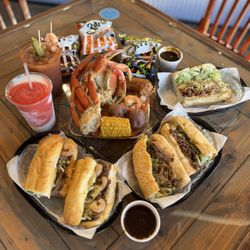 Boil House - Full Seafood Platter 1 Snow 1 Dungeons Crab 1/2 lb Shrimp 1 Link 1 Corn 2 Potatoes