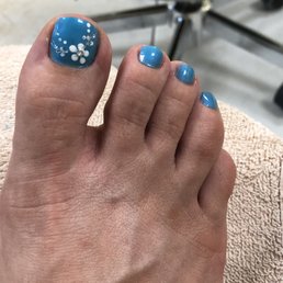 Pedicure with a cute flower