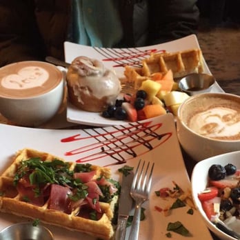Moore Coffee Shop - Prosciutto waffle, house-made granola parfait, Nutella latte, plain waffle w/fruit, cinnamon roll and hot chocolate!! All delicious. - Coffee & Tea Near Me - Seattle, Washington Moore Coffee Shop - Prosciutto waffle, house-made granola parfait, Nutella latte, plain waffle w/fruit, cinnamon roll and hot chocolate!! All delicious. - Coffee & Tea Near Me - Seattle, Washington