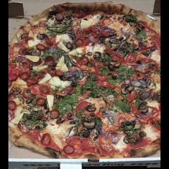 Mama's Boy - Split pie- fresh and garlicky  Pizza should be eaten the same day/night because it doesn't reheat well. - Pizza Near Me - Oakland, California